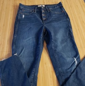 Madewell high-rise skinny jean with button front.